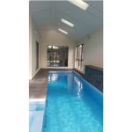 Custom Built Home with Indoor Pool Built From Knockdown and Rebuild Project
