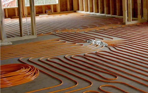 Hydronic heating being laid under the floor for a new home being built in Melbourne